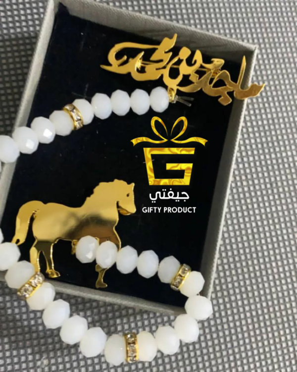 بروشات ذهب بالاسماء-بتصميم حصان